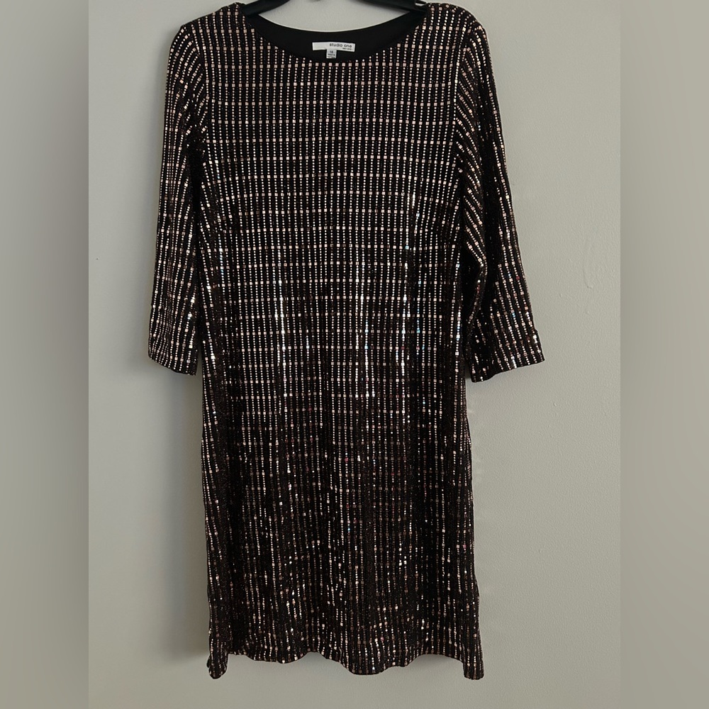 Party dress, with gold metallic squares and circles on black spandex fabric.